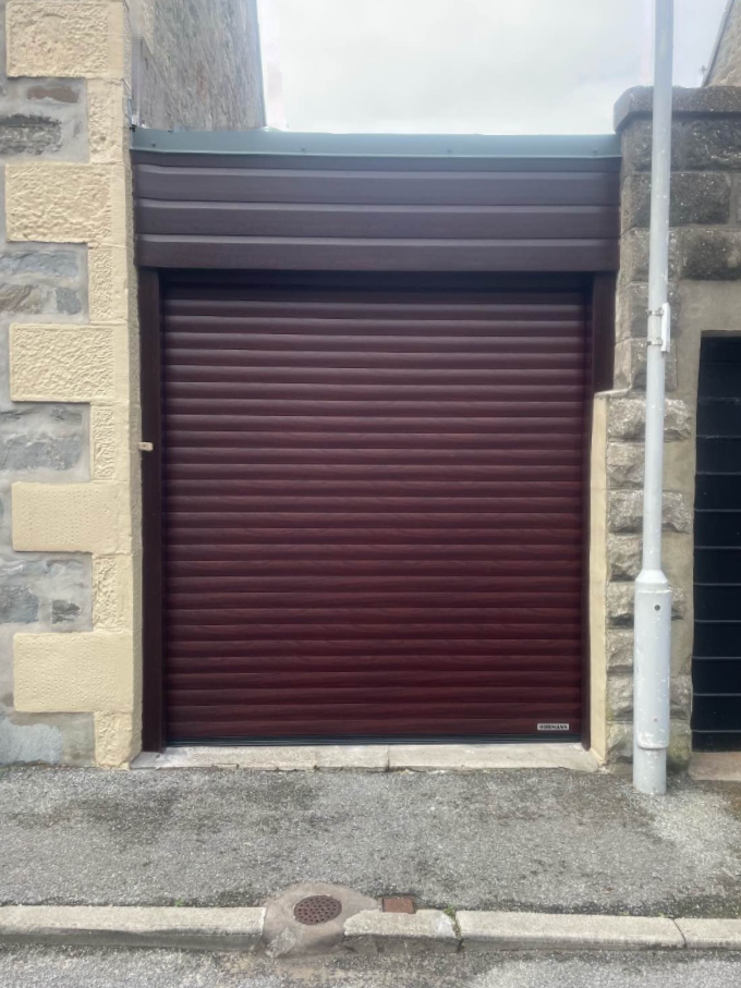 Hormann magenta door fitted in a very tight space.